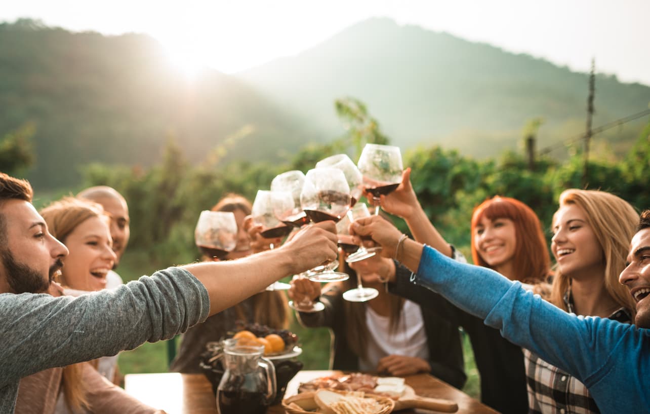 People cheering at a winery